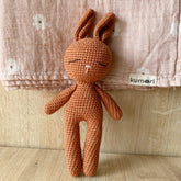 Hand-crocheted cinnamon bunny sleep toy made with organic cotton yarn